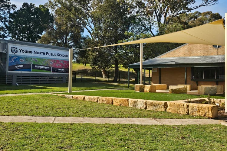 photo of schools yarning circle covered by a shade sail.